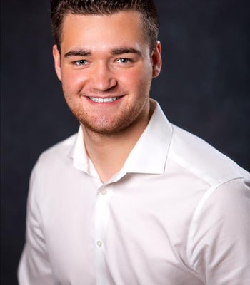 Portrait of Kolby Klingenmeyer, Licensed Associate.